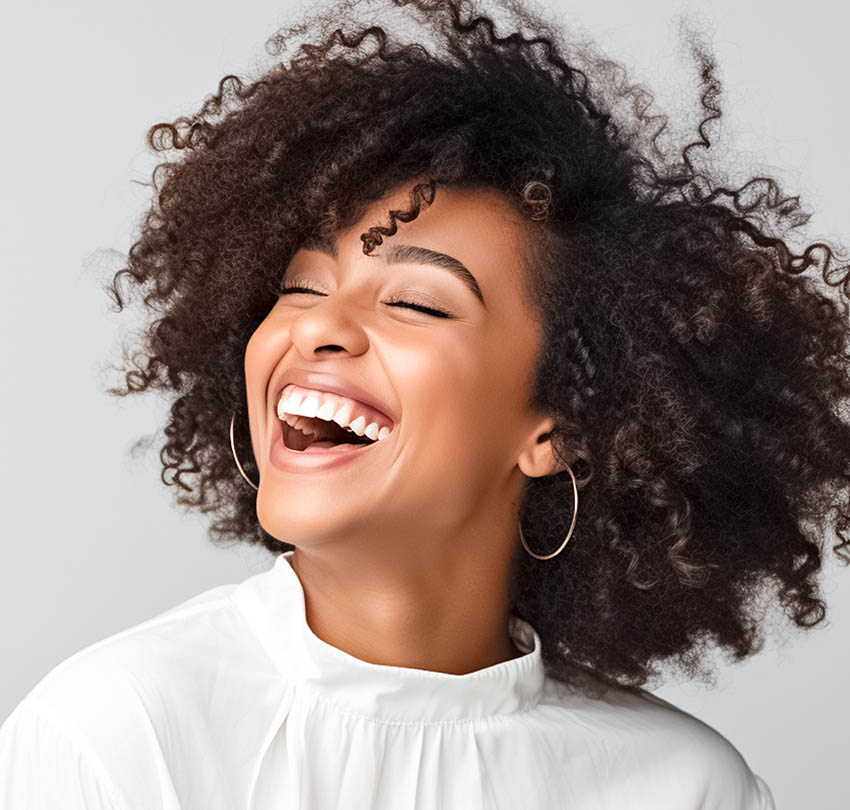 Girl putting Invisalign aligners on